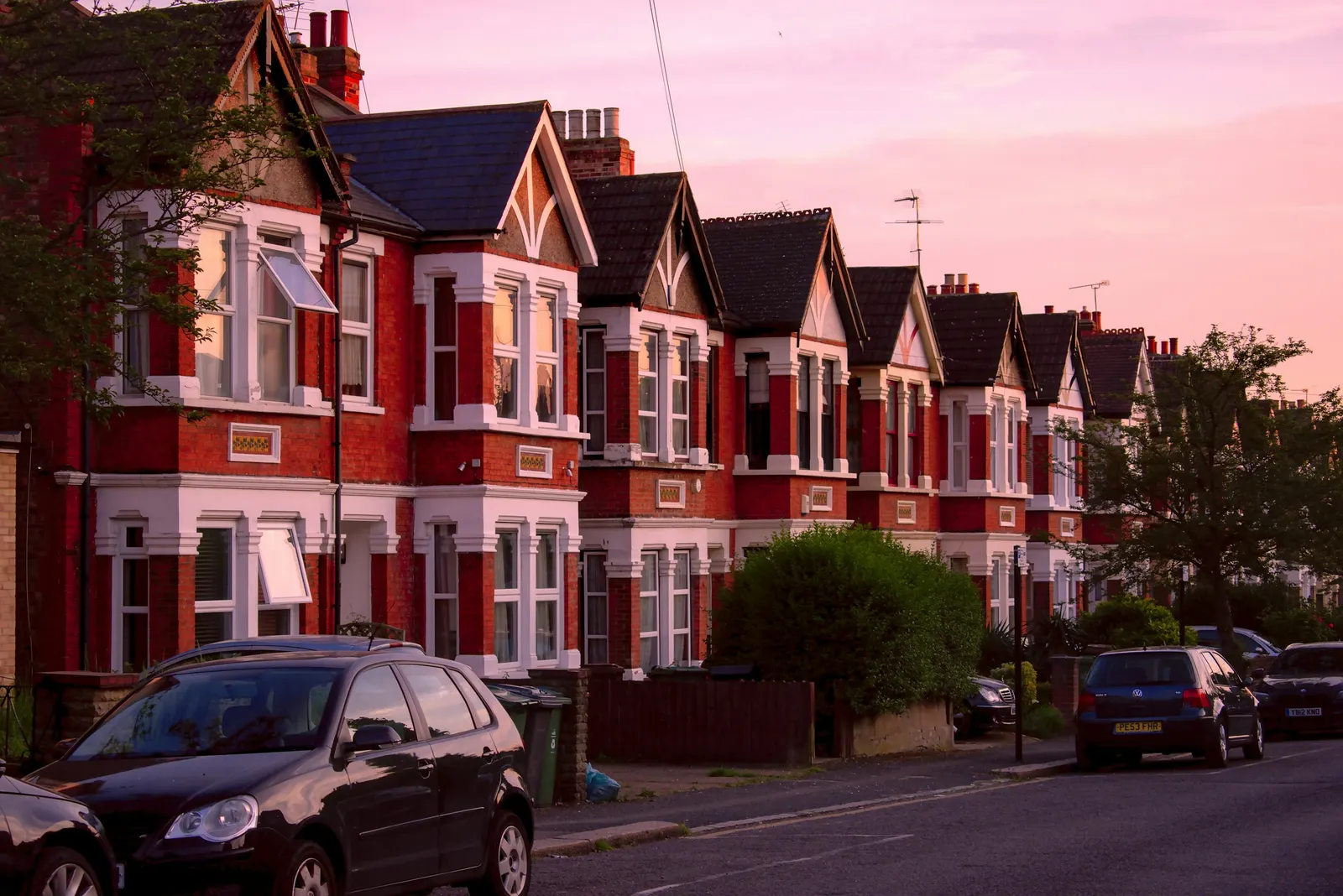 Victorian terrace street with bay windows, the kind of street where a rear or side extension is refused over a neighbour's outlook
